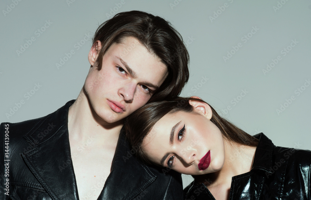 Fashion young couple in studio. Fashion models. Romantic portrait of sensual young couple. Couple in love. Vogue couple embracing. Studio fashion portrait. Catalogue-style look. Fashion shoot. Fashion young couple in studio. Fashion models. Romantic portrait of sensual young couple. Couple in love. Vogue couple embracing. Studio fashion portrait. Catalogue-style look. Fashion shoot.