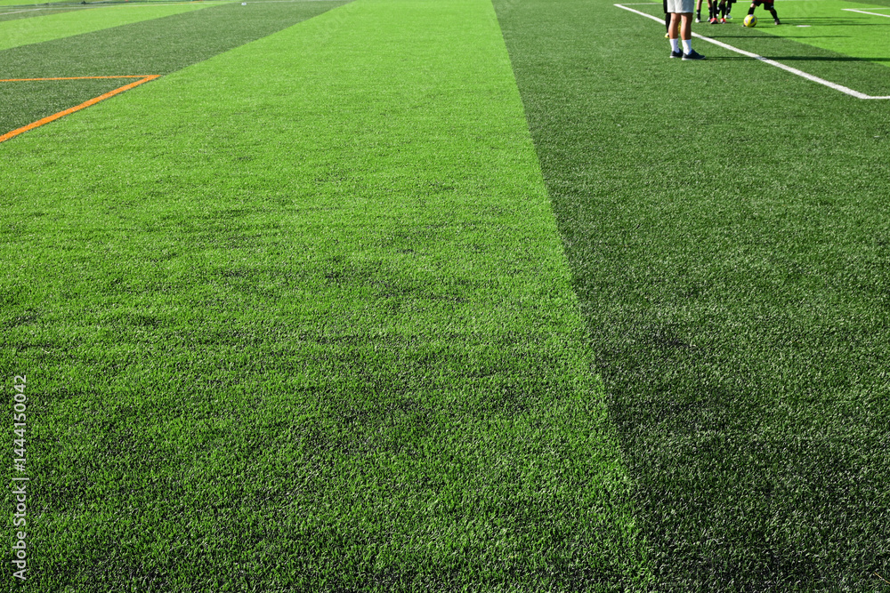 Obraz premium artificial green grass background for playground