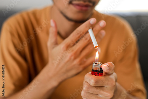 Wallpaper Mural Smoker lighting a cigarette with lighter Torontodigital.ca