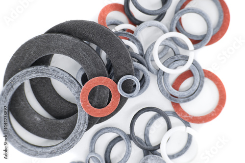 A detailed view showcasing an assortment of rubber and fiber gaskets in various sizes and colors.