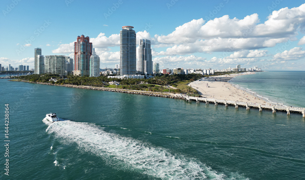 Miami beach cityscape. Miami summer aerial view. Miami Beach shoreline. South Beach Miami aerial view. Blue ocean in Florida skyline. Miamis cityscape. Ocean coast.