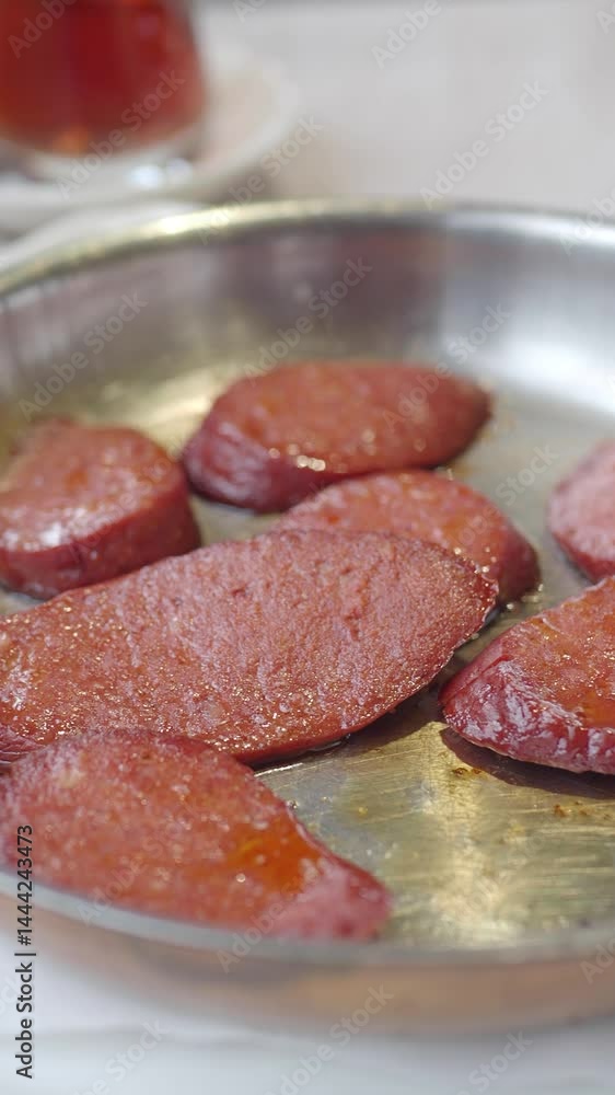 Sizzling sausages on a bowl Sizzling sausages on a bowl