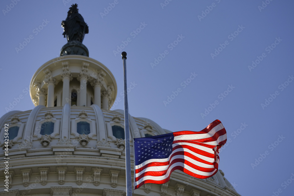 The United States Capitol as a symbol of democracy in Washington, DC. The Capitol building on Capitol Hill. US government. American flag adorns the dome of the historic Capitol. The Senate.