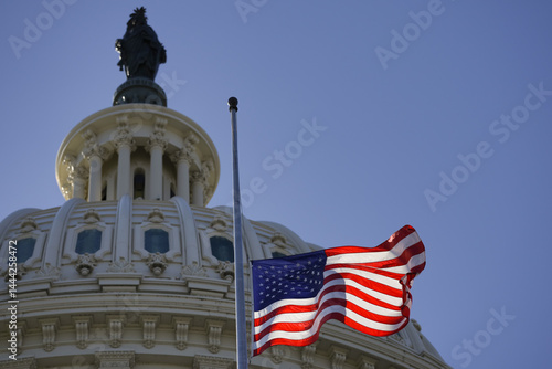 Obraz na płótnie The United States Capitol as a symbol of democracy in Washington, DC. The Capitol building on Capitol Hill. US government. American flag adorns the dome of the historic Capitol. The Senate. w salonie