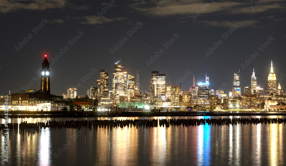 New York City. NYC cityscape with skyscrapers. Panoramic of New York City skyline. Manhattan skyline. New York and Hudson River. Downtown NYC. New York skyscrapers. The business district of NYC.
