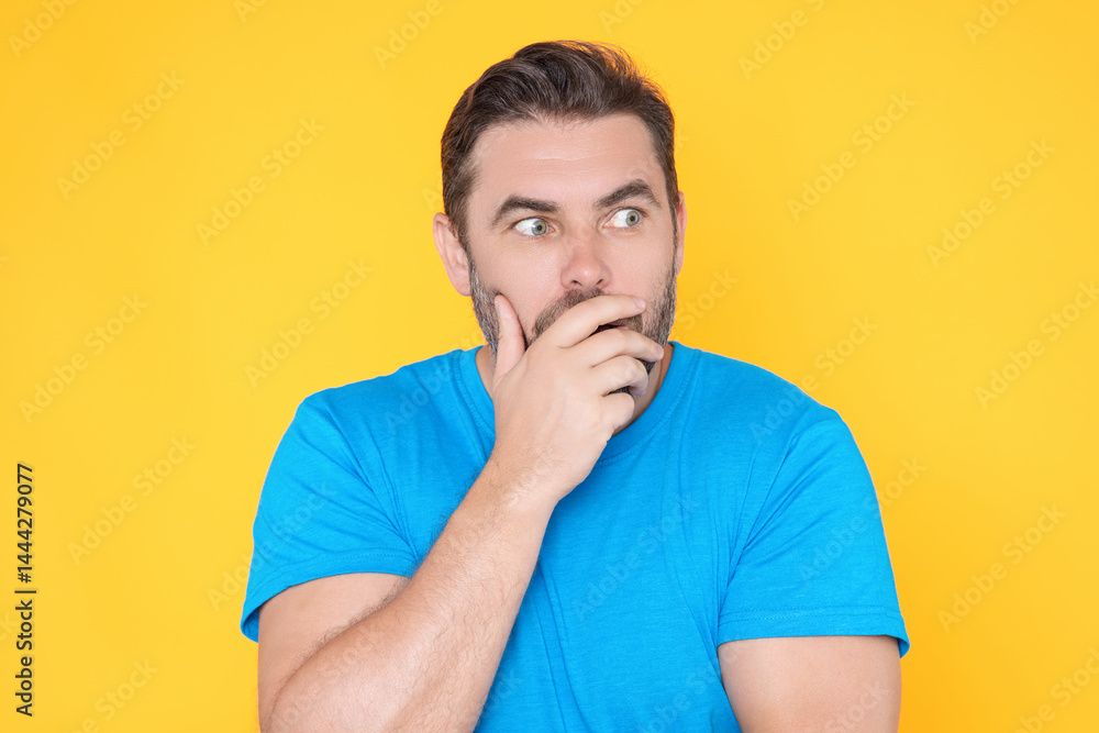 Portrait of shocked unshaven caucasian man afraid and shocked with surprise expression, fear and excited face. Emotion people. Shocked man with great disbelief, expresses surprisment and astonishment.