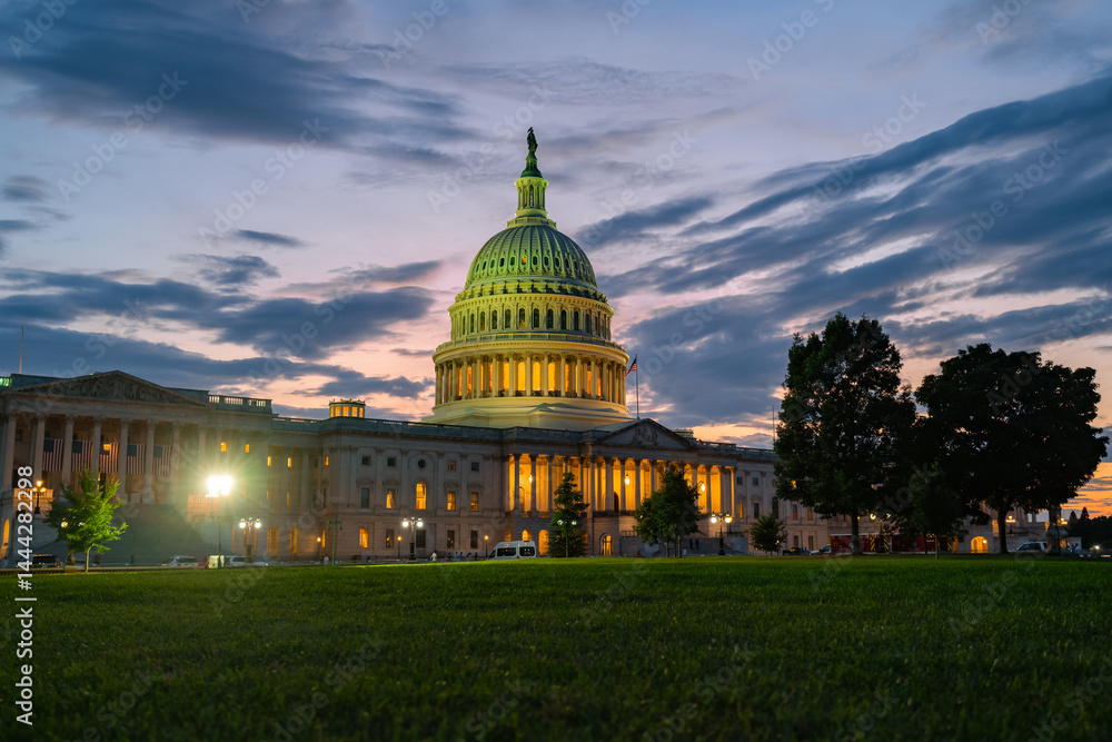 The United States Capitol as a symbol of democracy in Washington, DC. The Capitol building on Capitol Hill. US government. American flag adorns the dome of the historic Capitol. The Senate.