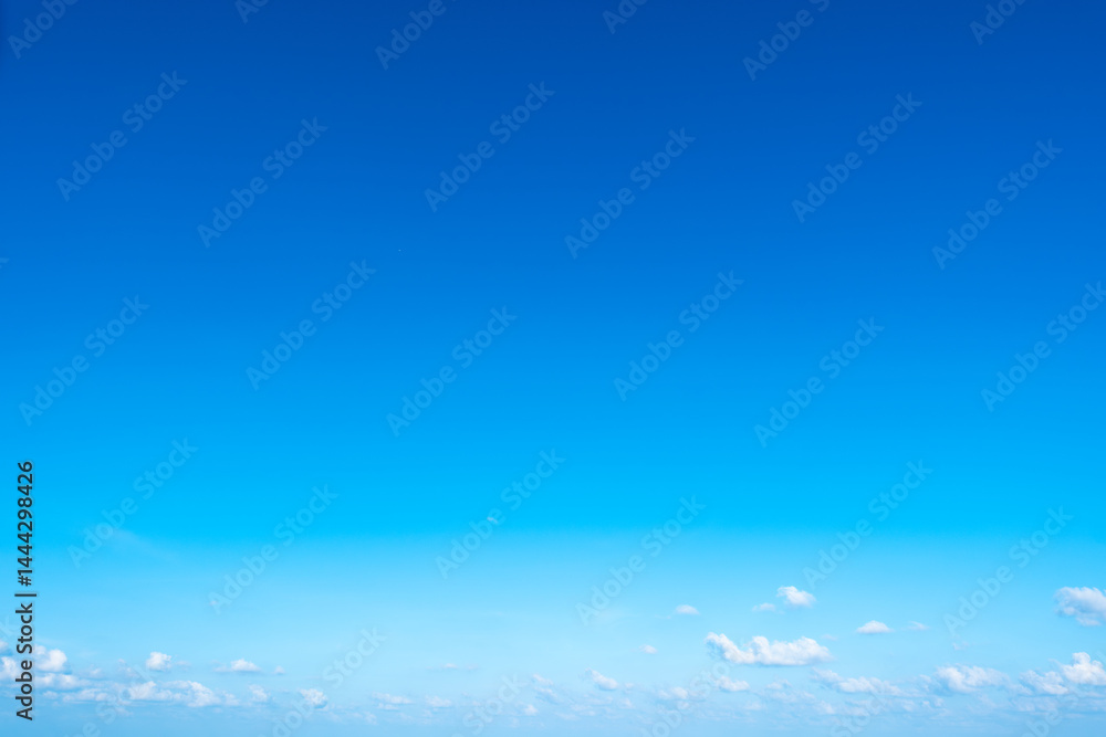 Fototapeta premium Panorama of cloud clear sky background for summer vacation concept at ocean and summer sea water with sunlight of beautiful cloudy