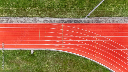 Fototapeta Naklejka Na Ścianę i Meble -  Running track aerial drone view background from above, athletic stadium with track lines bird’s view, sport and fitness infrastructure in the Netherlands