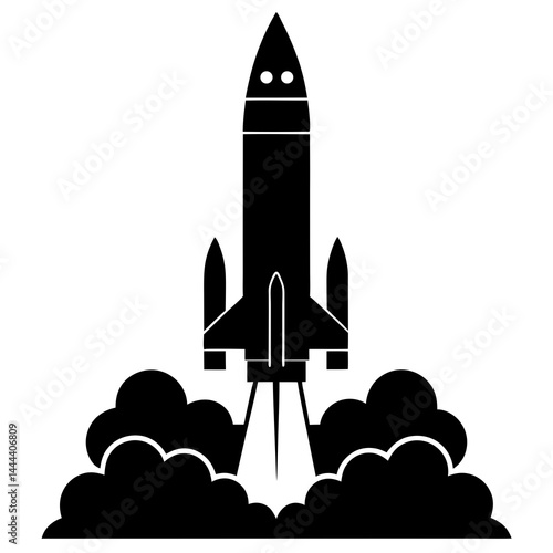 Silhouette of a rocket launching with smoke clouds and exhaust on a launch pad
