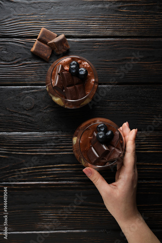 Obraz na płótnie Chocolate mousse in a glass on a dark background. w salonie