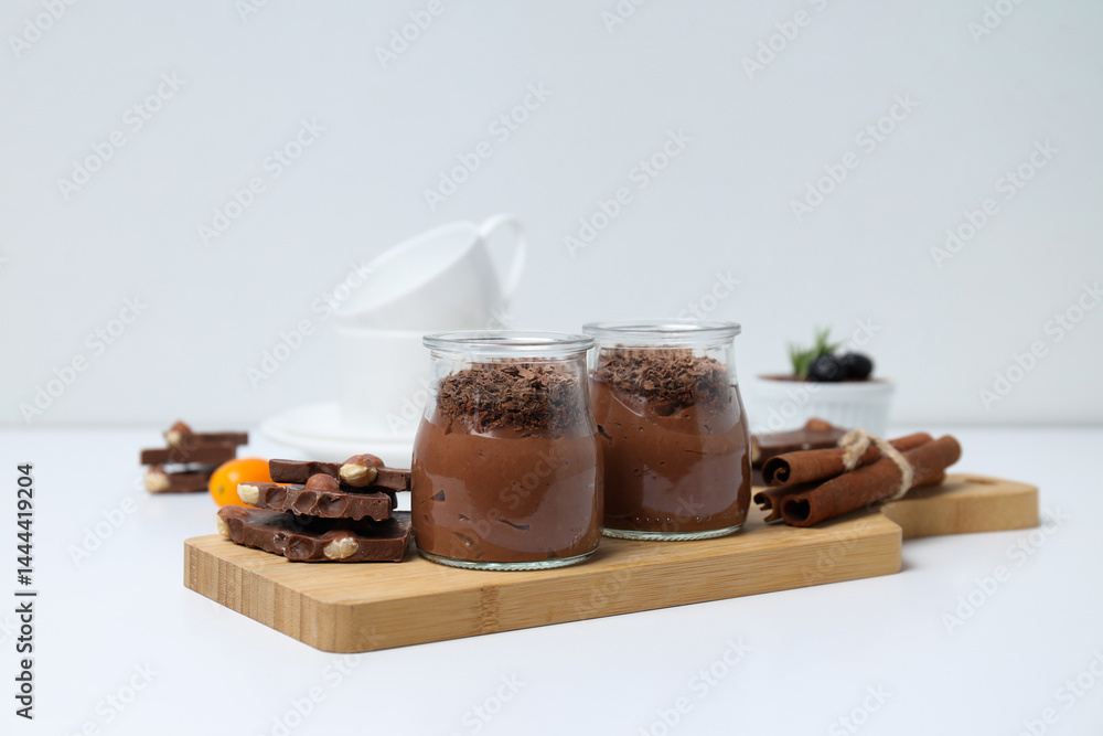 Preparation of chocolate mousse, on a light table.