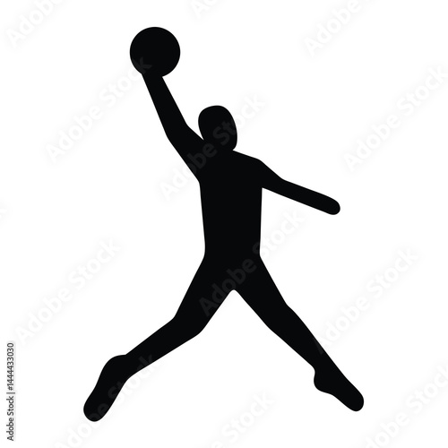 Silhouette of a basketball player in mid air dunking a ball