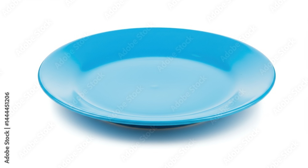 A light blue empty plate is centered on a white background with a soft shadow underneath it A light blue empty plate is centered on a white background with a soft shadow underneath it