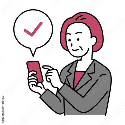 スマートフォンでチェックする中年のスーツの女性