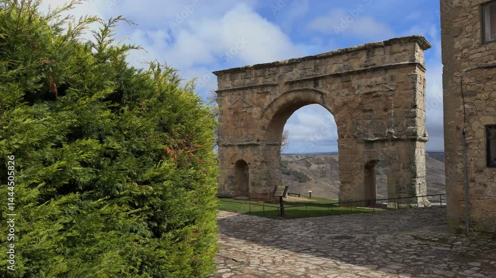 Historic Roman Arch in Medinaceli, Soria, Spain with Windy Atmosphere Historic Roman Arch in Medinaceli, Soria, Spain with Windy Atmosphere