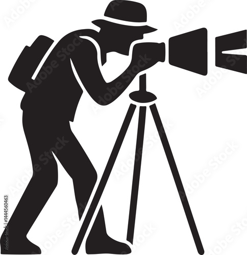 A black silhouette of a professional photographer with a digital camera and lens suggests a cameraman in a studio