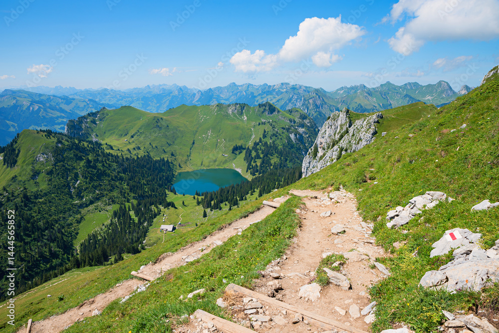 hiking trail with stunning views at Stockhorn mountain, switzerland. lake Oberstockensee, bernese Oberland