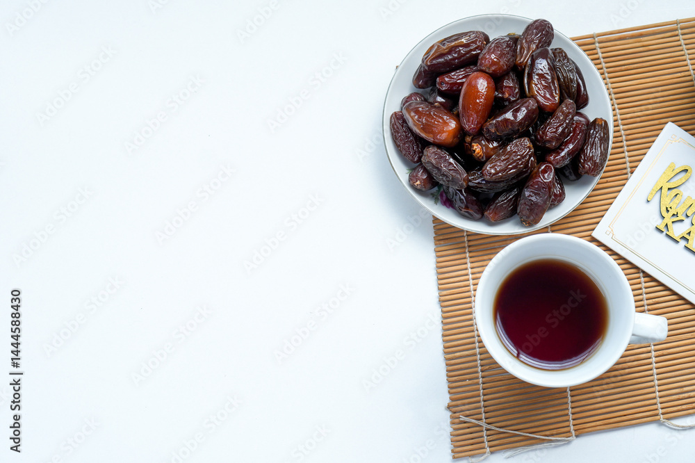 Close Up Of Dates Fruit And Hot Tea For Iftar Or Suhoor During Fasting On Ramadan Month Close Up Of Dates Fruit And Hot Tea For Iftar Or Suhoor During Fasting On Ramadan Month