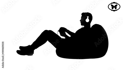 Silhouette of Person on Beanbag Chair Wearing Headphones and Holding Controller | Isolated Gaming Relaxation for Entertainment and Lifestyle Marketing