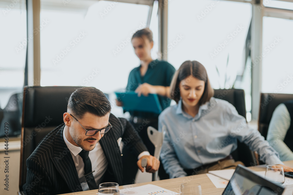 A diverse group of business people are engaged in a discussion around a conference table. The setting is modern and emphasizes teamwork and collaboration in a corporate environment. A diverse group of business people are engaged in a discussion around a conference table. The setting is modern and emphasizes teamwork and collaboration in a corporate environment.