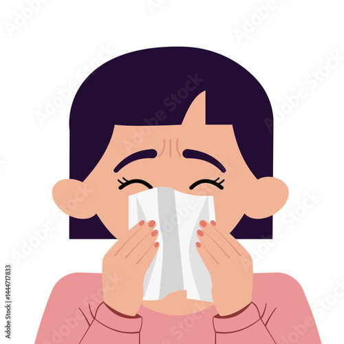 Young girl blowing her nose