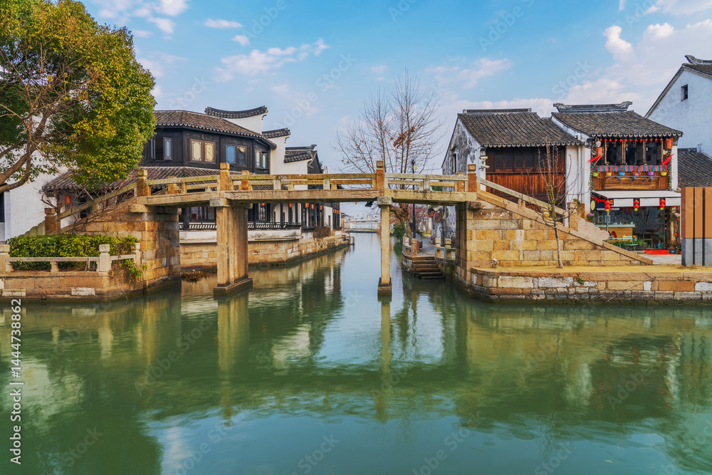 Fototapeta premium The Ancient Architecture, Bridges, and Tourism Landscape of Zhouzhuang Ancient Town in Suzhou, Jiangsu Province On April 18th, 2023 
