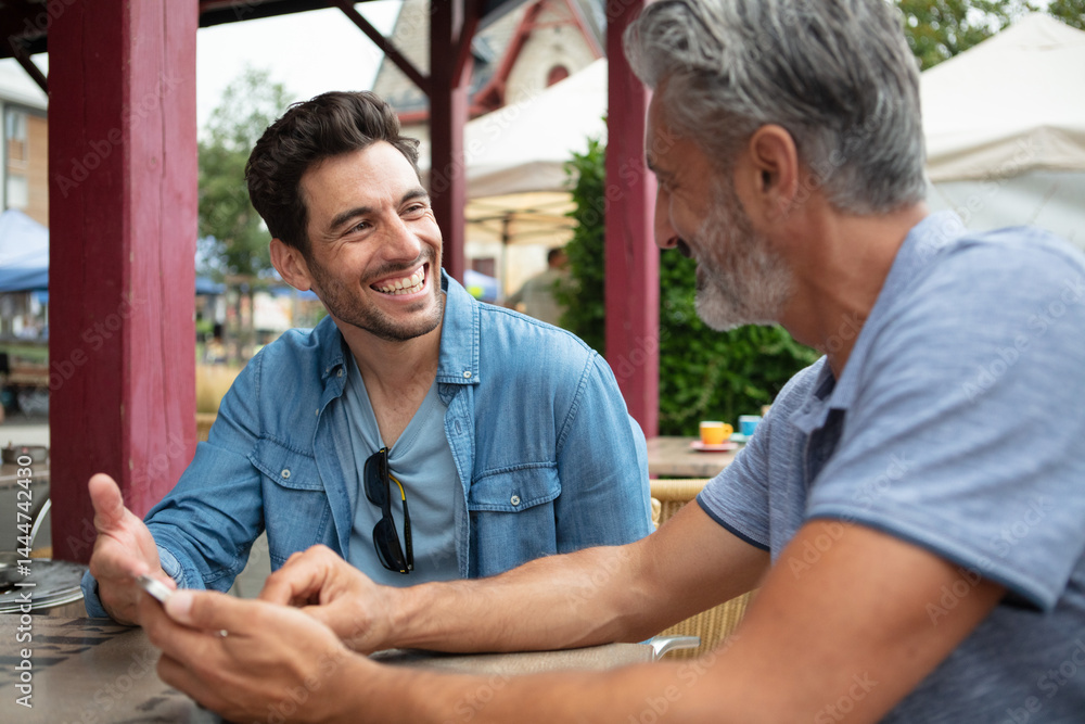 happy men friends talking together