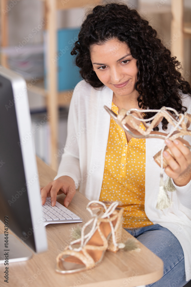 woman using computer to shop online