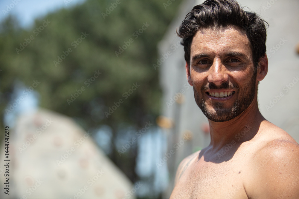 happy man relaxing seated in a sailing ship