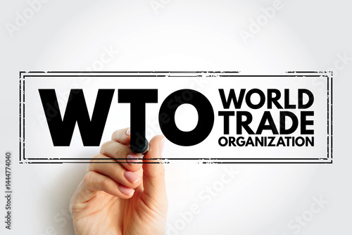 WTO World Trade Organization - intergovernmental organization that regulates and facilitates international trade between nations, acronym text stamp