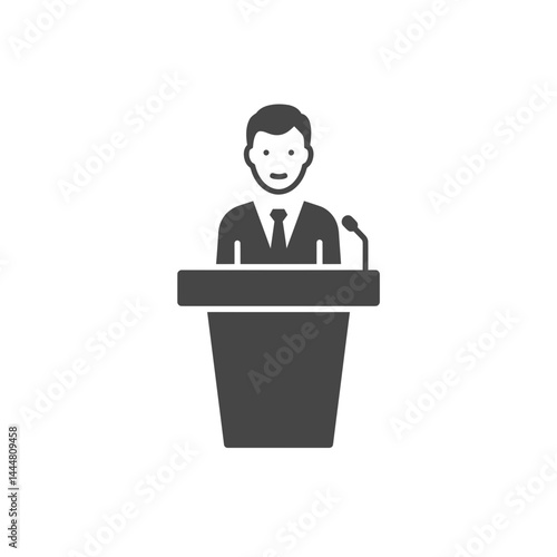 Orator's address: An image of an orator, standing behind a podium, delivering a speech with a microphone, a visual representation of communication and public speaking.
