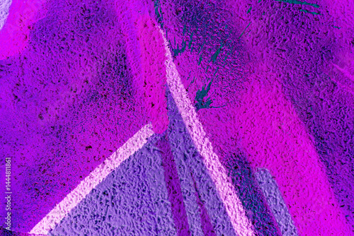 Art under ground. Beautiful street art graffiti background. The brick wall is decorated with abstract drawings house paint. Modern style urban culture of street youth. Abstract picture on wall