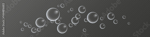 A set of colorful and colorful soap bubbles to create a design. Isolated, transparent, realistic soap bubbles on a transparent background.