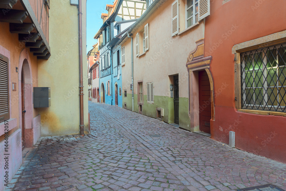 pedestrian street of old town of Colmar, most famous town of Alsace, France, retro toned