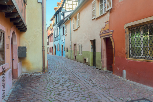 Obraz na płótnie pedestrian street of old town of Colmar, most famous town of Alsace, France, retro toned w salonie