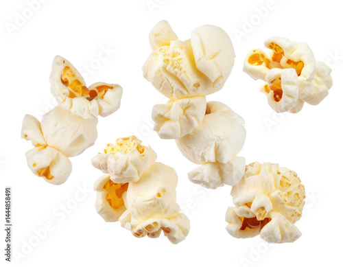 Obraz na płótnie Popcorn pieces on isolate background create a playful, snack-themed visual. w salonie
