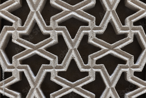 Obraz na płótnie Intricate Arabic geometric pattern featuring interconnected symmetries w salonie