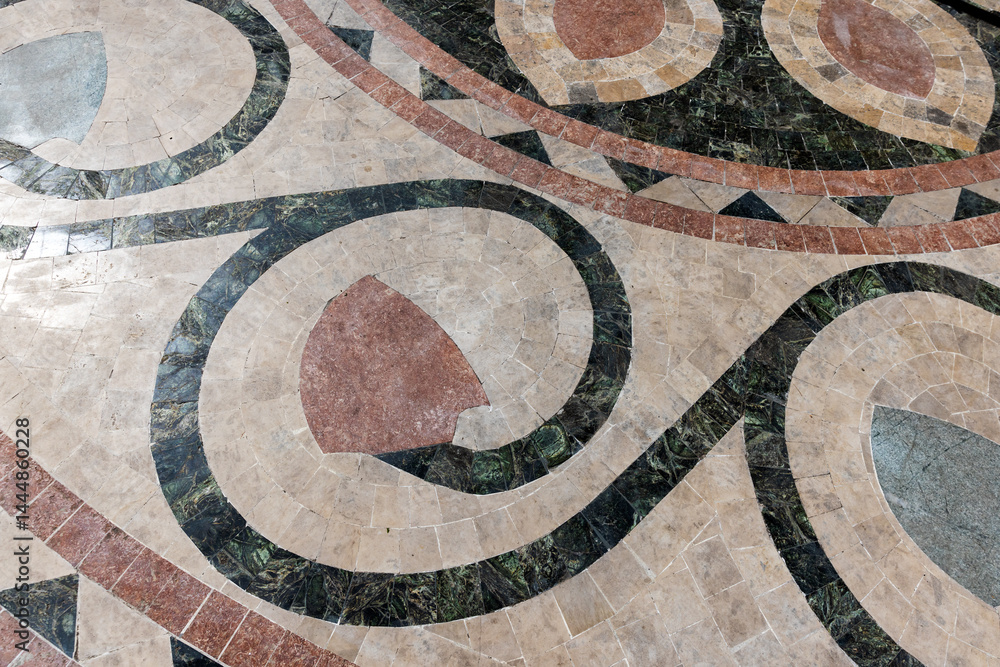 Intricate geometrical design on a tiled floor