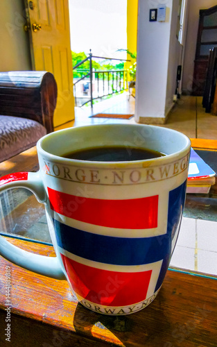 Canvas Print Coffee in a norwegian style cup on the table in Mexico.