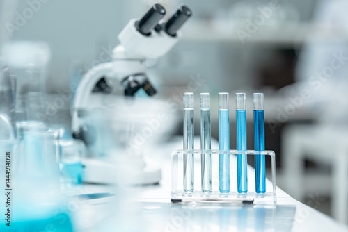 Chemical laboratory glassware with blue liquid samples in test tubes, scientific research experiment, biotechnology innovation, pharmaceutical analysis development, medical diagnostics