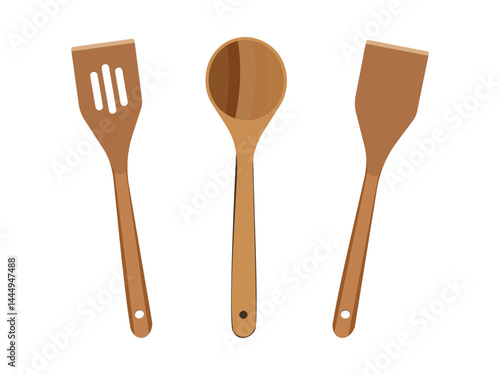Set of three wooden kitchen spatulas with different shapes and designs isolated
