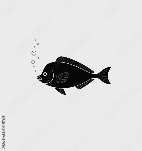 Black Silhouette of a Fish Swimming Underwater