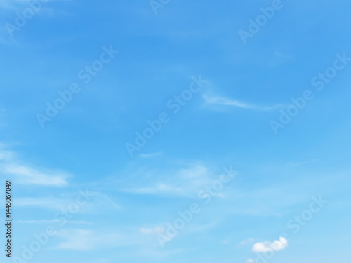 Obraz na płótnie Blue sky background and white clouds soft focus, and empty space, horizontal shape. w salonie