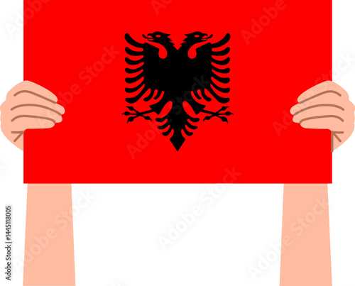 Woman's hand holding the Albania flag 