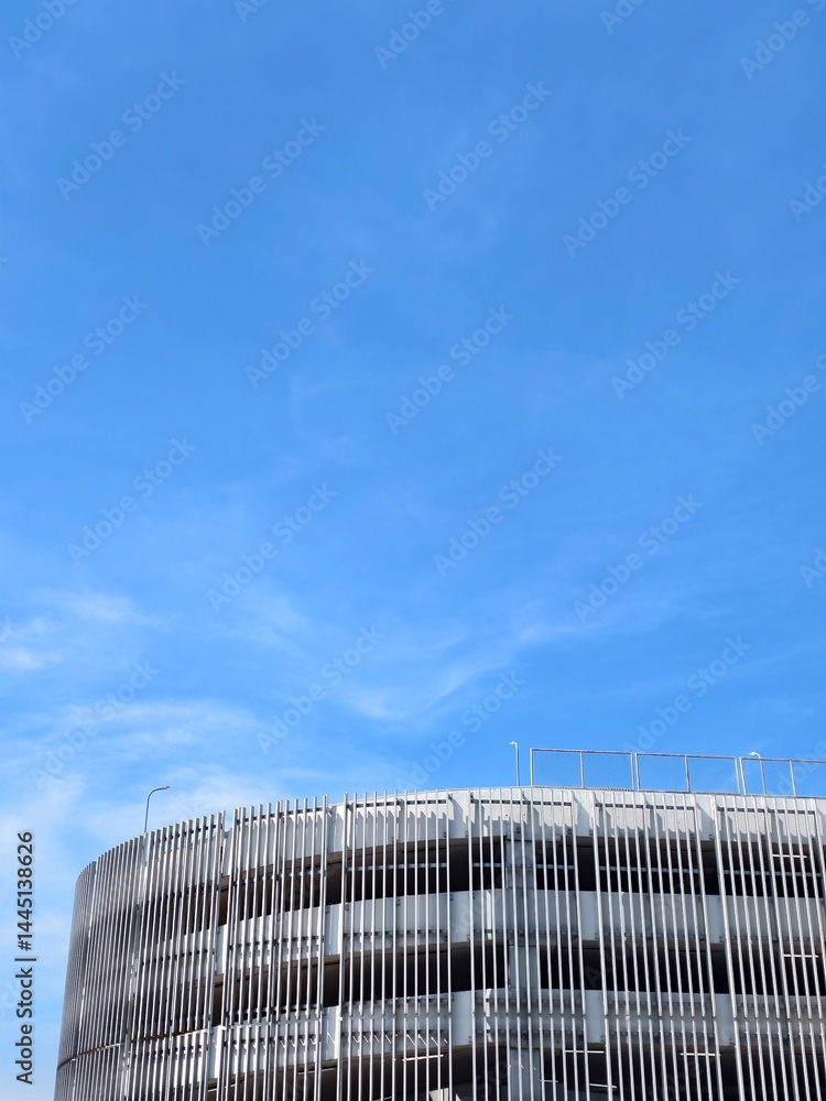 Fototapeta premium Modern Parking Structure Under Bright Sky