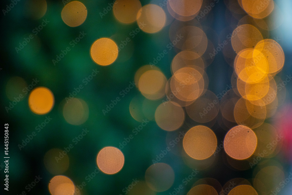 Christmas garland warm lights bokeh on green background