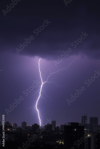 Dramatic Lightning Strike Over Cityscape at Night