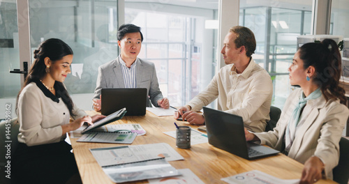 Collaboration, meeting and planning with business people in office for development or discussion. Documents, laptop and tablet with employee team in corporate workplace for conversation or strategy