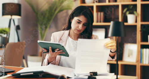 Woman, tablet and paperwork in office for business, contract review and case study in law firm. Lawyer, technology and legal document in agency for planning, compare research and administration